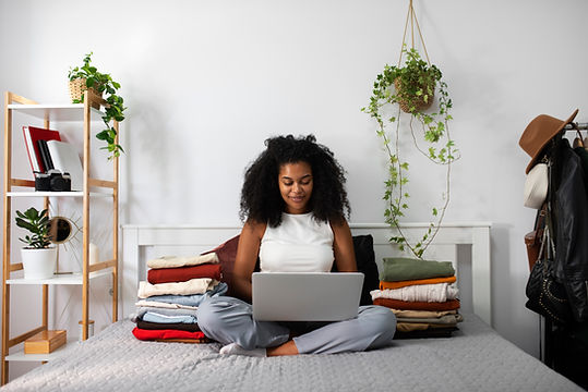 full-shot-woman-holding-laptop.jpg